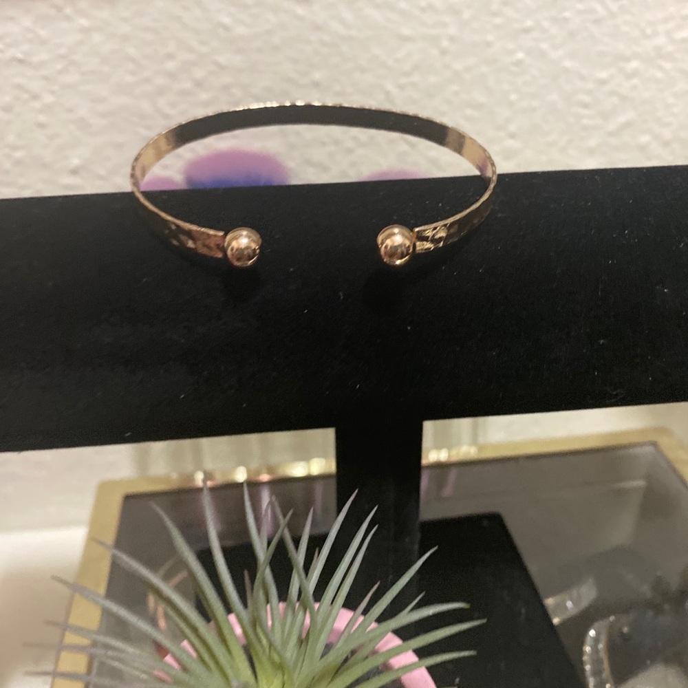 Gold open bangle